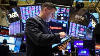 Wall Street dans le vert avec l'IA, avant les chiffres de l'inflation