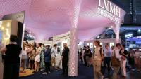 Des visiteurs devant le stand LVMH Dreamscape, au salon VivaTech à Paris, le 12 juin 2025
