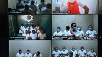 Montage d'images diffusé par le bureau du procureur général du Salvador, le 1er avril 2026, montrant des prisonniers détenus dans différentes prisons, lors d'un procès collectif en ligne enregistré au Centre judiciaire de lutte contre le crime organisé, à Soyapango, au Salvador, le 23 mars 2026