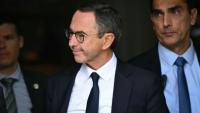 Le ministre de l'Intérieur sortant Bruno Retailleau (c), le 6 octobre 2025 à Boulogne-Billancourt, près de Paris